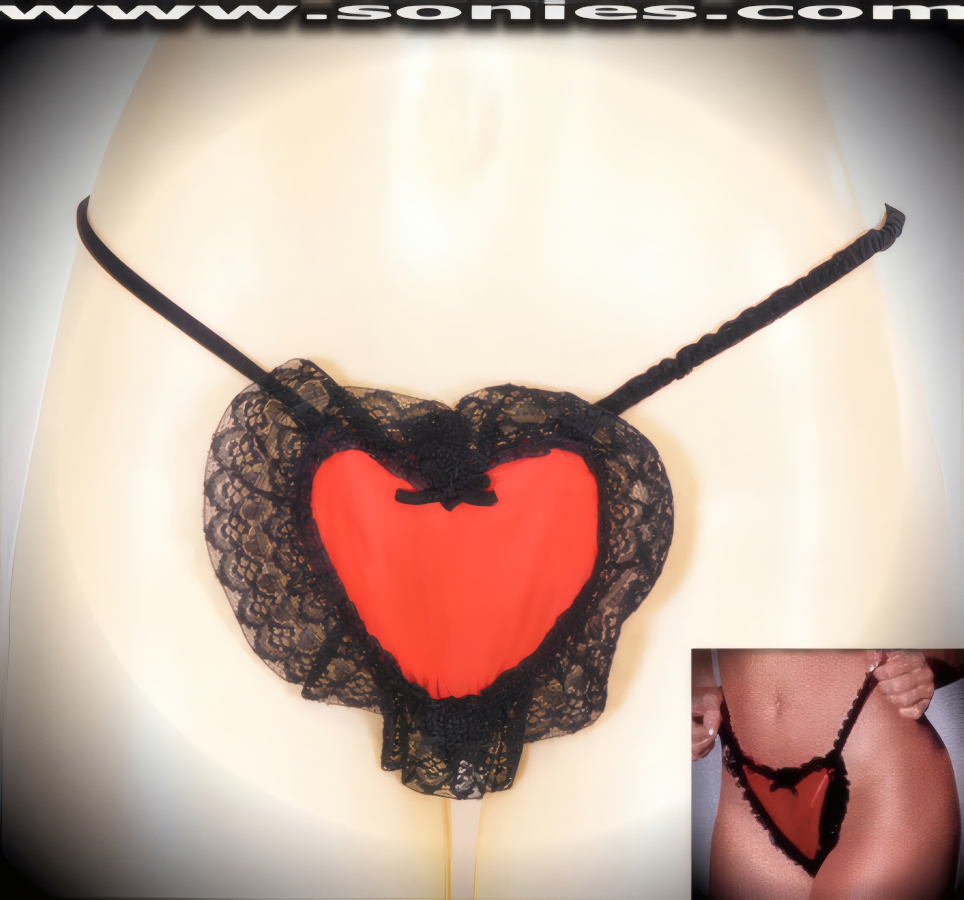 Love your body in this Venus heart shaped satin panty with micro lined scallop floral lace thong back. These stunning handcrafted panties features a silky soft satin fabric with black sheer scallop floral lace edging, and elasticized waistband to ensure a great fit, plus a bow front accent appliqu� finally. The low rise design makes the torso look longer for an incredibly seductive silhouette (100% Nylon. Wash delicate and hang dry).   Style: 144017A