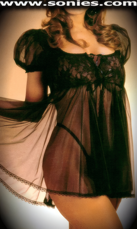 He loves me�he loves me hot as you make a night time fashion statement in this fabulous Bereng�ria stretch floral lace with satiny soft sheer mesh two piece set. Satin ribbon tie front babydoll with scallop lace edging detailing finish, plus a complementing sheer G-String panty with lace edging included (100% Nylon, exclusive of trim. Hand wash cold and drip dry. Do not bleach). May be worn with stiletto heel shoes to create a phenomenal look. This style is perfect for bedroom performance, life style events, monthly play parties, fetish events, adult alternative lifestyle gatherings, bachelor parties and gentleman's clubs.   Style: 1575