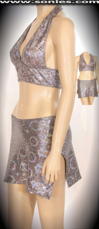 An All-Out Alluring and Well-Sculpted Dancewear Three Piece Stretch Lycra Set. Halter Style Crop Top with Skin Baring Low Dipping Neckline, Clasp Back Neck Closure for Off and On Ease Detail Finish. Complementing Hip Hugging A-Line Mini Skirt with Sexy Slit Sides, Metal Zipper Sides plus Metal O-Ring Puller Finally for Added Peek-A-Boo Teasing Effect. Complete with Matching Center Stage Dance Wear Micro Lined Thong Back Bottom (15% Lycra, 85% Nylon).   Style: 208ADSH