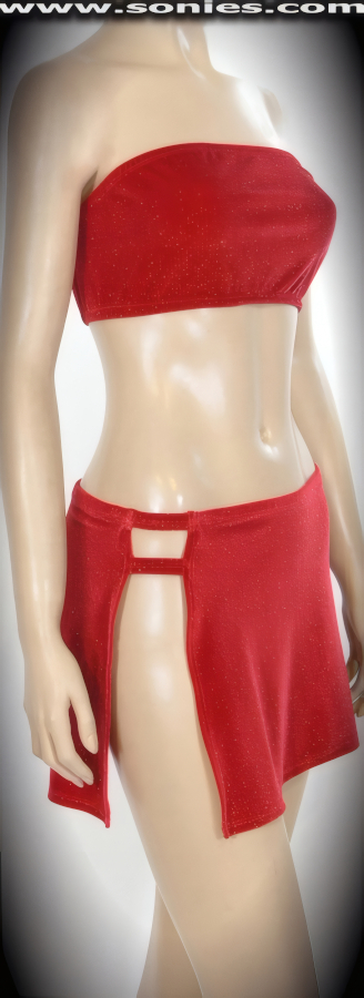 Express yourself in a unique way in this Atacazo two piece stretch glitter slinky Lycra set. Curvature hugging bandeau top and matching pull-on mini skirt that skims the hips and shows plenty of leg. Skirt has dual strappy sides and extremely high side slits finally (15% Lycra, 85% Nylon exclusive of trim. Hand wash cold and drip dry, no bleach). It pairs beautifully with any number of risqu� gloves. May be worn with stiletto heel shoes or boots to create a phenomenal look. This style is perfect for stage, life style events, pride week, monthly play parties, fetish events, adult alternative lifestyle gatherings, bachelor parties, club wear, nightclubs, dance clubs and gentleman's clubs.   Style: 208FDSH