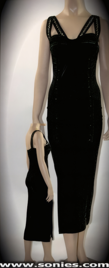 Body-Loving, Sleek Stretch Satin Lycra Pull-On Long Gown with Suede Bust-Out Cleavage Finally. Softly Padded Suede Cups to Enhance the Bust, Dramatic Cut-Out Dual Front Straps with Sculpted Bodice and Front Thigh High Slits Detail Finish. Bead Accented to Enhance its Dramatic Appeal (15% Lycra, 85% Nylon, Suede). May be worn with stiletto heel shoes to create a phenomenal look. This style is perfect for stage, life style events, pride week, monthly play parties, fetish events, adult alternative lifestyle gatherings, bachelor parties, club wear, nightclubs, dance clubs and gentleman's clubs.   Style: 24560