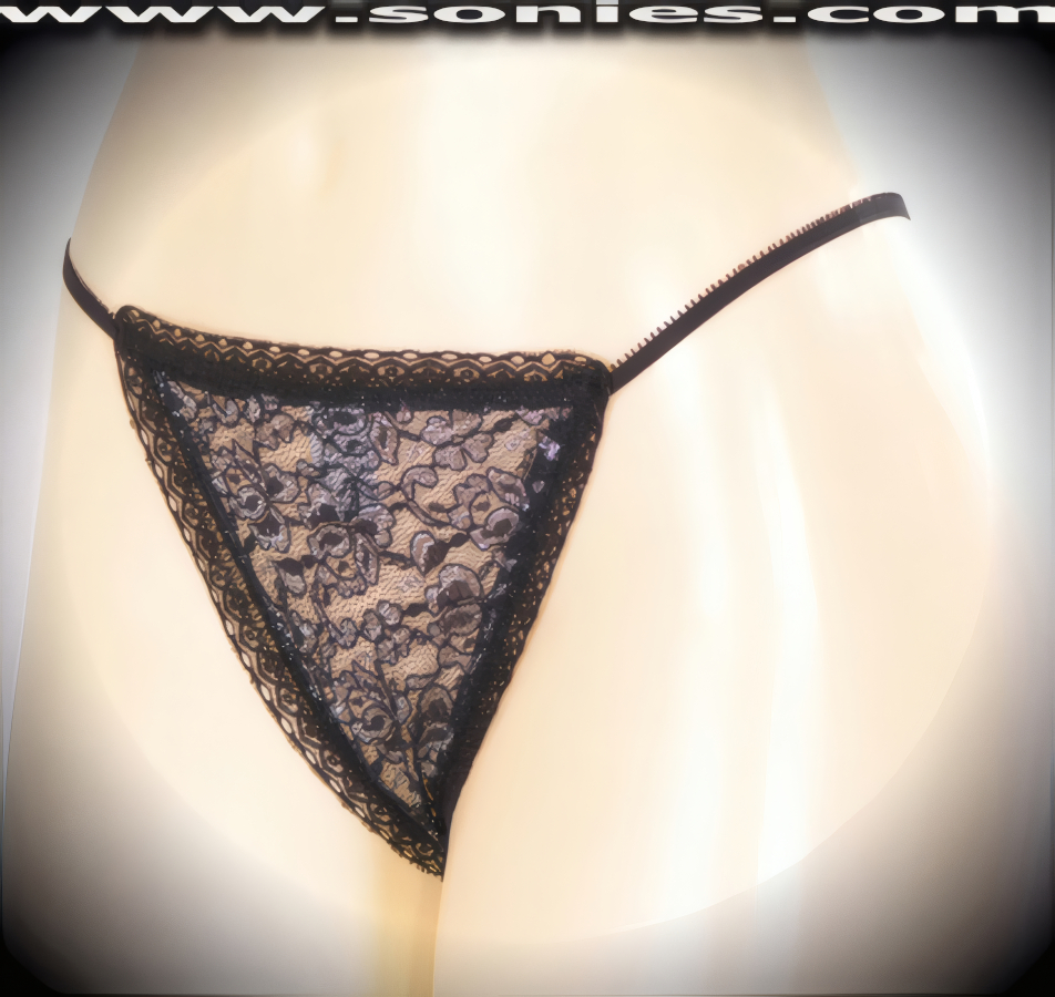 Slip into this Shuksan low-rise black sheer floral lace with glitter silver Lurex G-String back panty and suggestive unlined crotch detail finish, that is so sexy, you'll (almost) never want to take it off. Crafted with a soft elasticized waistband and back to ensure a great fit, plus exquisite floral scallop lace edging (Nylon/Lycra. Hand wash cold, hang dry, no bleach). It pairs beautifully with any number of risqu� tops. May be worn with stiletto heel shoes to create a phenomenal look. This style is perfect for stage, bedroom performance, life style events, pride week, monthly play parties, fetish events, adult alternative lifestyle gatherings, bachelor parties and gentleman's clubs.   Style: 3GB-ST
