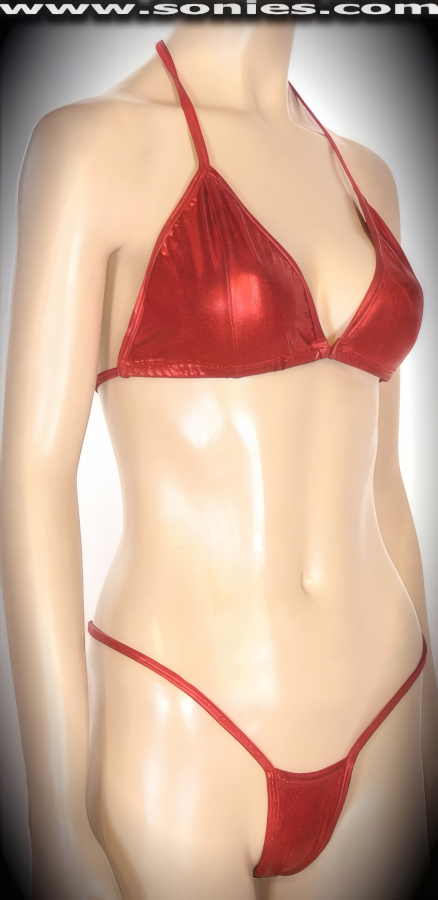 Reveal your racy side in this Eiger red metallic stretch Lycra liquid Lam� bikini set. Adjustable slide and tie triangle top for minimal or maximum coverage and is designed to fit all busts. Complementing micro thong bottom with lined crotch detail finish. This sleek yet seductive style is specially designed for supreme fit and comfort. Created using four way stretch metallic glow Lycra fabric to trace your bodies contour (15% Lycra, 85% Nylon. Wash delicate and hang dry. Exposure to salt water and chlorine not recommended). May be worn with stiletto heel shoes to create a phenomenal look. This style is perfect for professional exotic dancers, life style events, pride week, monthly play parties, fetish events, adult alternative lifestyle gatherings, bachelor parties, club wear, gentleman's clubs, and to look your best at the beach or lounging at the pool.   Style: 565-055LB