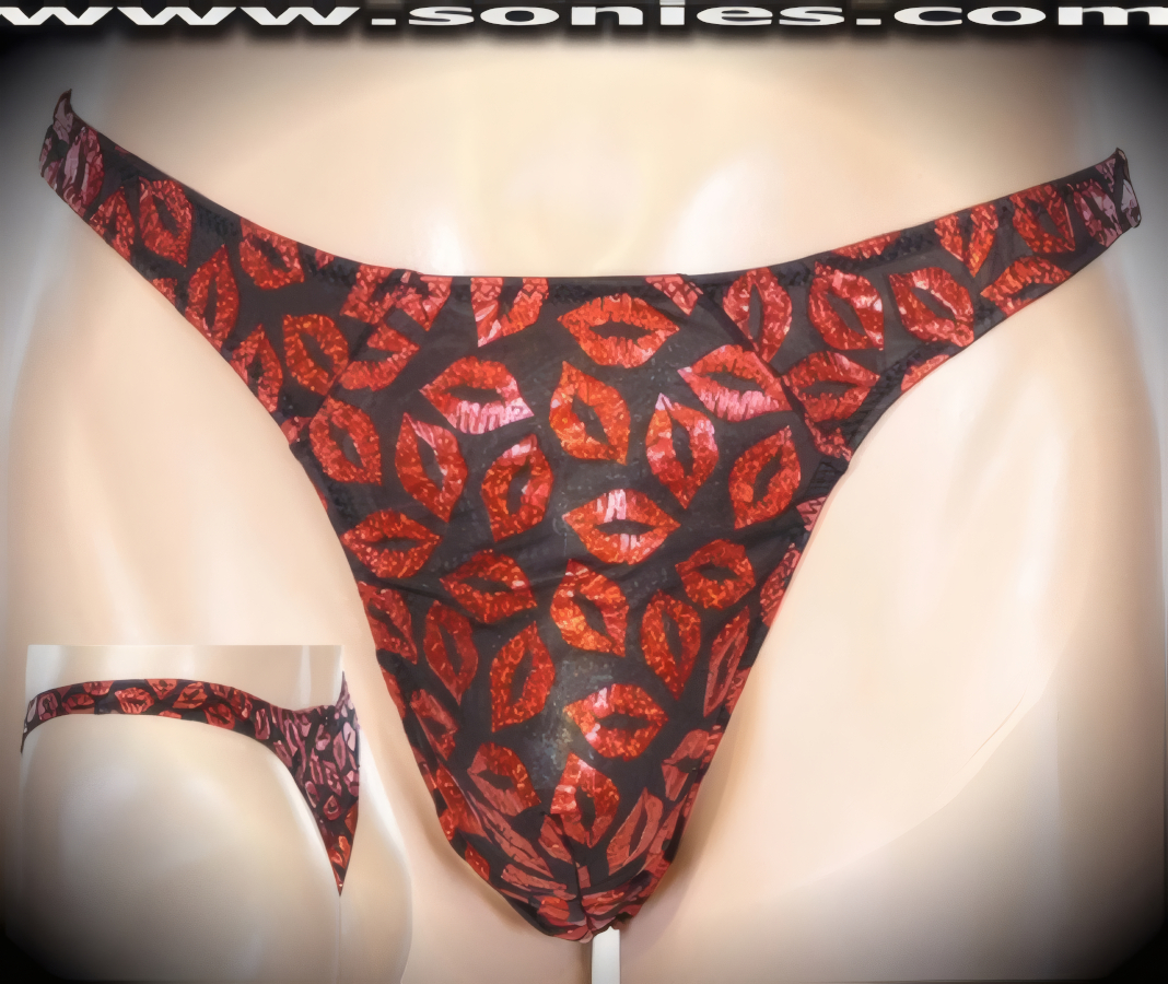 Men's Semi-Sheer Penthesilea Glitter Foil Sexy Lips Dance Wear Thong with Unlined Contoured Front Pouch to provide support and room for your package. This is a thong that contours and conforms to every bulge and curve (Spandex/Nylon).   Style: 7004