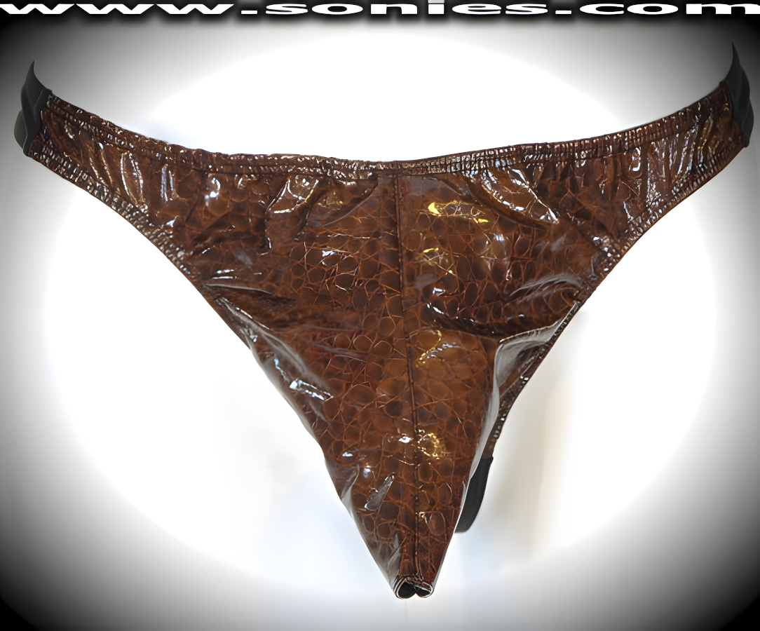 Men's Freedom Extender Croc Print Patent Leather Dance Wear Thong. Exquisitely designed with Front Shaft Opening plus Stretch Lycra Back to Provide just the right amount of stretch for a Comfortable Body-Hugging and Supportive Fit. Remarkable and sexy-looking for all those special occasions.   Style: SHR-550C