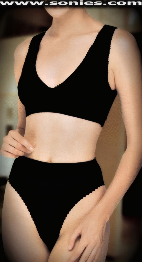 Cleverly Feminine Designed French Body Briefer Two Piece Set - as Only the French can do. Opaque Body Defining Low Scoop Neckline Cami with Soft Scalloped Elasticized Edging and Complementing Hi-Cut American Back Unlined Brief (100% Nylon).   Style: 9513PRI