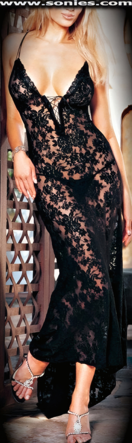 El muerto al caj�n y el vivo al la celebraci�n in this stunning plus size Astley sheer stretch Spanish floral lace long dress with elasticized spaghetti shoulder straps to ensure a great fit. Crafted with a bi-directional lace-up front bodice, plus train back skirt detail finish. Includes a matching G-String back panty to complete this splendid vesture (100% Nylon, exclusive of trim. Hand wash cold and drip dry. Do not bleach). It pairs beautifully with any number of risqu� gloves. May be worn with stiletto heel shoes to create a phenomenal look. This style is perfect for bedroom performance, life style events, monthly play parties, fetish events, adult alternative lifestyle gatherings, bachelor parties and gentleman's clubs.   Style: HOQ-88000Q