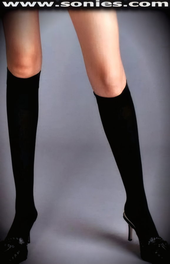 Fang-Tastic Opaque Knee High Stockings. Want the look of opaque tights from the knee down? Then just slip into these fabulous Nylon opaque knee highs (100% Nylon, exclusive of trim. Hand wash cold and drip dry. Do not bleach). An excellent alternative to basic sheer knee-highs, these opaque socks pair well with long skirts, miniskirts and trousers.    Style: K747