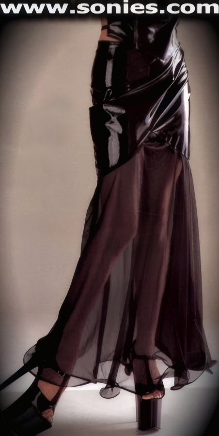 You'll Cause A Commotion In Our Dramatic Gothic Babe Contoured V-Shape Front Patent Leather (PVC) Long Skirt with Sheer Chiffon Bottom, Zip-Up Back Closure for Off and On Ease Detail Finish.   Style: V4077