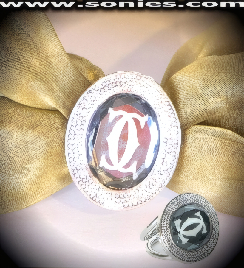Chryse�s elegant and stunning to wear silver oval shaped scarf slide holder ring with a oval boutique glass center. This beautiful design is crafted with dual rings to hold on to your scarf securely. It adds that little extra to a wardrobe to doll it up and is great if you hate to tie knots. Here is a simple way, take a scarf, put it around your neck, grab the two ends and place the ends through the loop of the rings and slide it up until you are satisfied with the opening, now  you have added another dimension to your wardrobe. You can even wear scarves around the waist and add a scarf slide holder ring or scarf clip there also. So the next time you see a lovely scarf, add a scarf slide holder ring. Oval Scarf ring: 1�-inch x 1-inch. Each circle: 2 cm wide.   STYLE: SJ-01A10