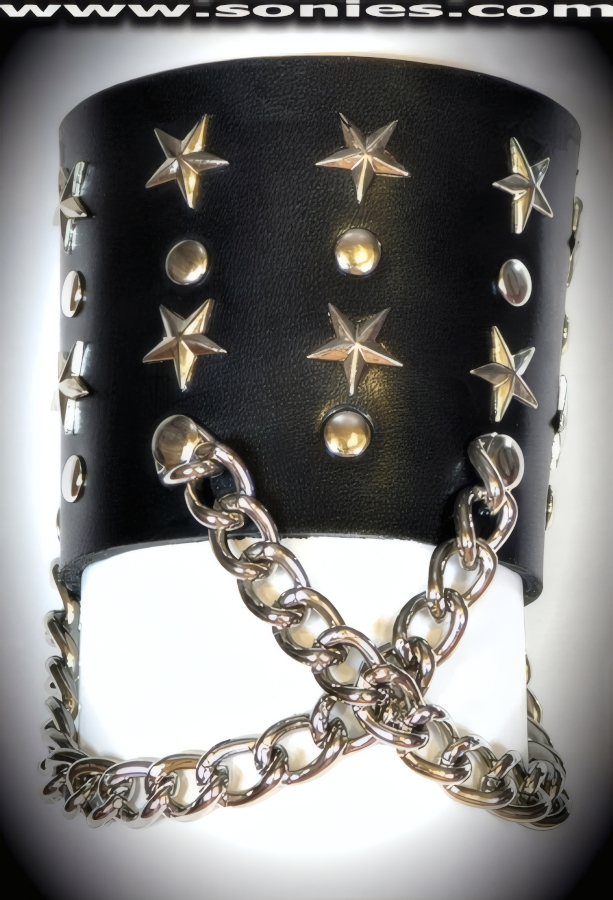 Black Corona Borealis handmade leather wristband. This 2�-inch wide leather wristband has four rows and is adorned with 14 metal stars, 14 metal rivets, and front criss-cross metal chain detail finish. Adjustable dual metal snaps closure to ensure a great fit. This style looks great with anything you wear and is perfect for stage, life style events, pride week, monthly play parties, fetish events and adult alternative lifestyle gatherings.   Style: WR003
