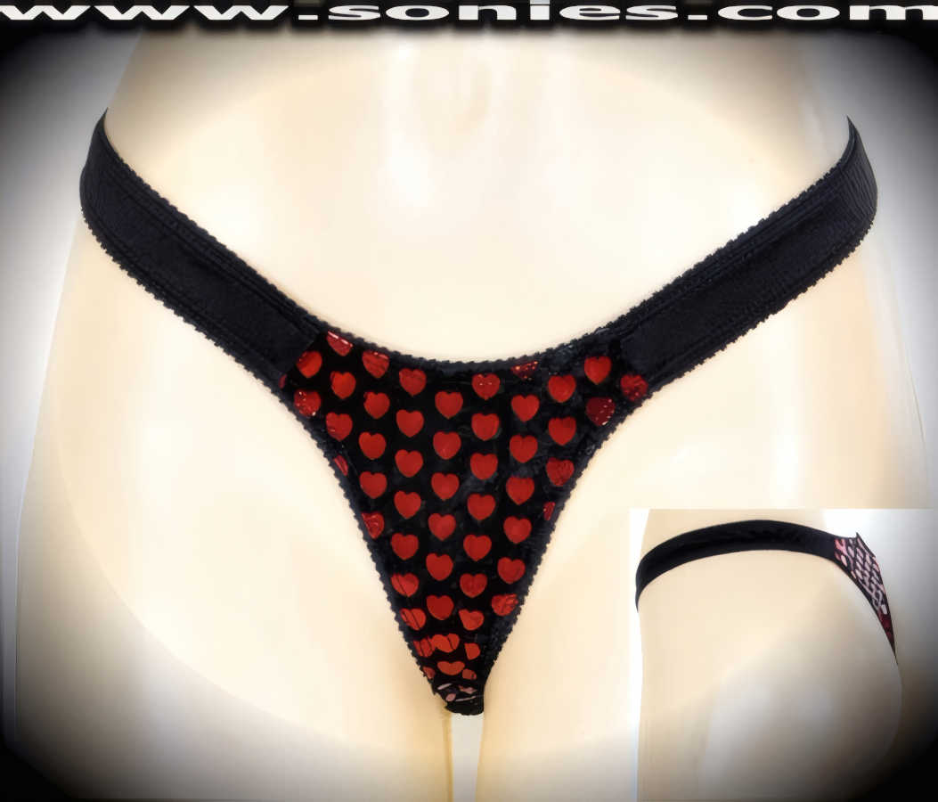 Go from sunset to sunrise in this stunning Delos scoop front rich black velvet with fiery red foil sequin hearts detailing dance wear low-rise bottom. Crafted with an exquisite stretch satin Lycra waistband detail finish to ensure a great fit (Velvet: 100% Polyester. Lycra: 15% Spandex, 85% Nylon. Hand wash cold, hang dry, no bleach). It pairs beautifully with any number of risqu� tops. May be worn with stiletto heel shoes to create a phenomenal look. This style is perfect for stage, bedroom performance, life style events, pride week, monthly play parties, fetish events, adult alternative lifestyle gatherings, bachelor parties and gentleman's clubs.   Style: 69AFC