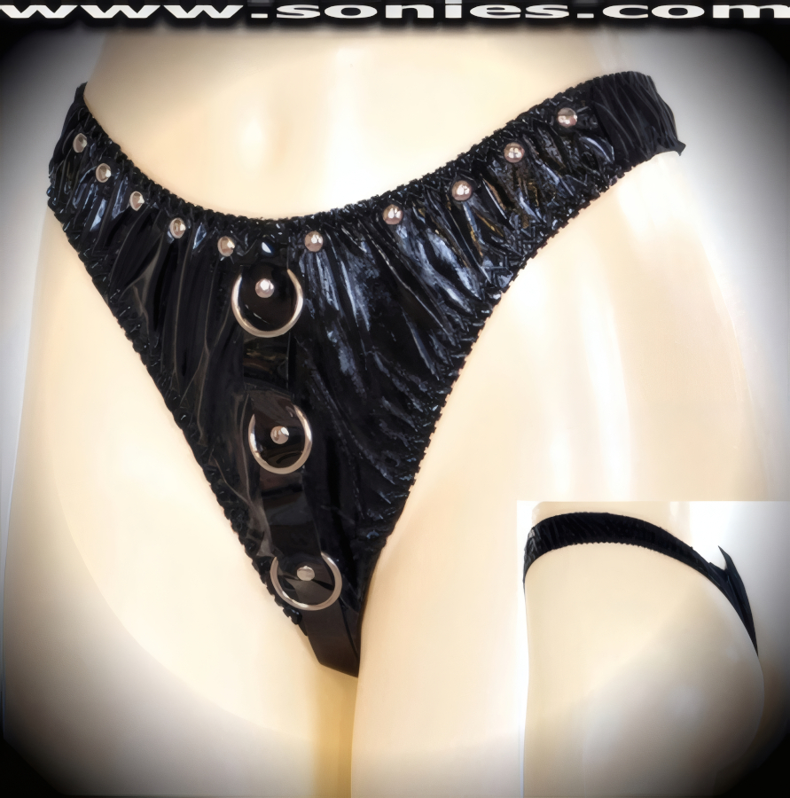 Complex and individualized is what you are in this ladies Pythagoreon racy black patent leather (PVC) dance wear low-rise bottom. Features a center front vertical band that is garlanded by three large metal O-rings and hand applied metal rivets on all stress points for durability, plus mercilessly sexy perimeter metal studs accent that are strategically separated to create an impressive look. Crafted with an exquisite stretch satin Lycra thong back to ensure a great fit (PVC: 35% Polyurethane, 65% Polyester. Lycra: 15% Spandex, 85% Nylon. Hand wash cold, hang dry, no bleach). It pairs beautifully with any number of risqu� patent leather (PVC) tops. May be worn with stiletto heel shoes or boots to create a phenomenal look. This style is perfect for stage, bedroom performance, life style events, pride week, monthly play parties, fetish events, adult alternative lifestyle gatherings, bachelor parties, club wear, nightclubs, dance clubs and gentleman's clubs.   Style: 69EFC