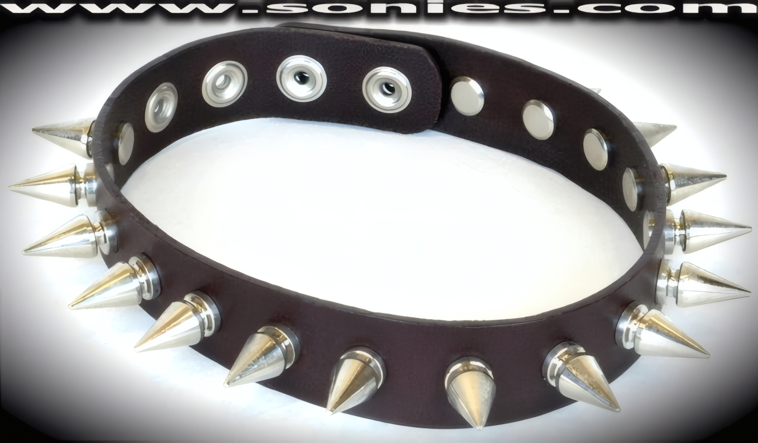 A passionate blend with prevailing appeal in this Dachstein quality �-inch wide leather collar with a single row of �-inch long screw on metal spikes and adjustable metal snaps closure (Sold as adult novelty only. This item may not be legal in your state or country therefore it is your obligation to check local and state laws before ordering). This style is perfect for stage, life style events, pride week, monthly play parties, fetish events and adult alternative lifestyle gatherings.   Style: LC-SPIKE1