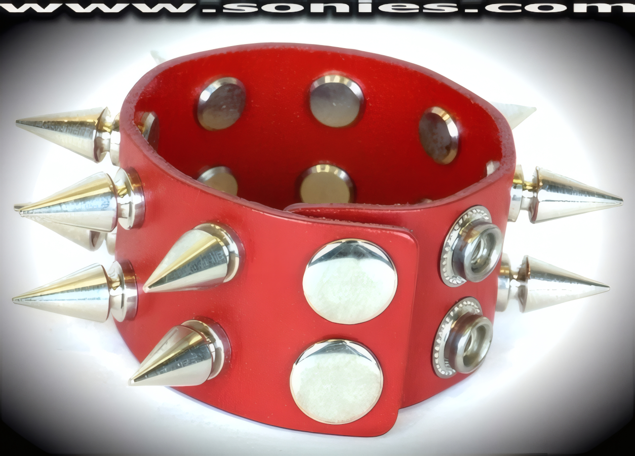 Attention Captivating in this Allalihorn leather wristband. A perfect accessory to add a little unconventional styling to your wardrobe. This quality piece is crafted from genuine leather and features bold metal spikes. 1�-inch wide leather with 2 rows of �-inch long screw on metal spikes and adjustable metal snaps closure (Sold as adult novelty only. This item may not be legal in your state or country therefore it is your obligation to check local and state laws before ordering). This style is perfect for stage, life style events, pride week, monthly play parties, fetish events and adult alternative lifestyle gatherings.   Style: LC-SPIKE2