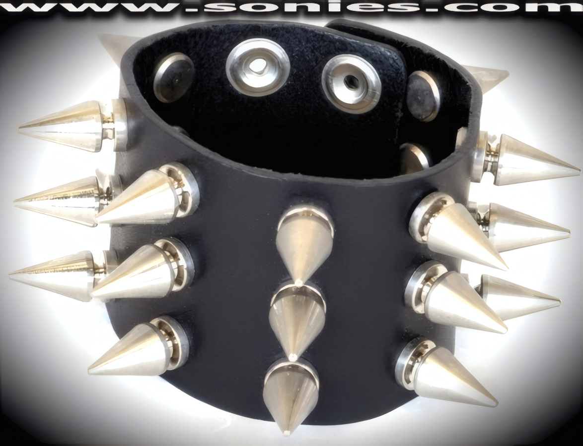 Complex and Individualized in this Alphubel leather extra wide wristband. A perfect accessory to add a indiscreet styling to your wardrobe. This quality piece is crafted from genuine leather and features bold metal spikes. 2-inch wide leather with 3 rows of �-inch long screw on metal spikes and adjustable metal snaps closure (Sold as adult novelty only. This item may not be legal in your state or country therefore it is your obligation to check local and state laws before ordering). This style is perfect for stage, life style events, pride week, monthly play parties, fetish events and adult alternative lifestyle gatherings.   Style: LC-SPIKE4