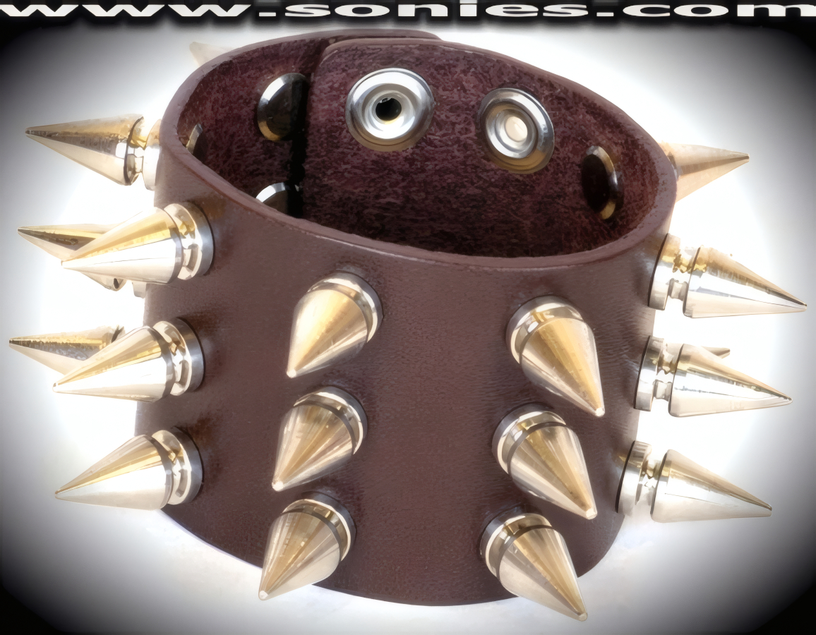 Complex and Individualized in this Alphubel leather extra wide wristband. A perfect accessory to add a indiscreet styling to your wardrobe. This quality piece is crafted from genuine leather and features bold metal spikes. 2-inch wide leather with 3 rows of �-inch long screw on metal spikes and adjustable metal snaps closure (Sold as adult novelty only. This item may not be legal in your state or country therefore it is your obligation to check local and state laws before ordering). This style is perfect for stage, life style events, pride week, monthly play parties, fetish events and adult alternative lifestyle gatherings.   Style: LC-SPIKE4