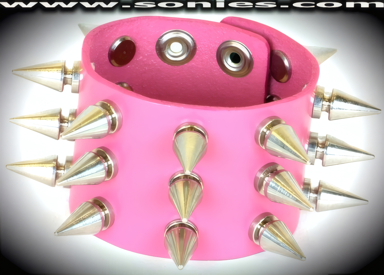Complex and Individualized in this Alphubel leather extra wide wristband. A perfect accessory to add a indiscreet styling to your wardrobe. This quality piece is crafted from genuine leather and features bold metal spikes. 2-inch wide leather with 3 rows of �-inch long screw on metal spikes and adjustable metal snaps closure (Sold as adult novelty only. This item may not be legal in your state or country therefore it is your obligation to check local and state laws before ordering). This style is perfect for stage, life style events, pride week, monthly play parties, fetish events and adult alternative lifestyle gatherings.   Style: LC-SPIKE4