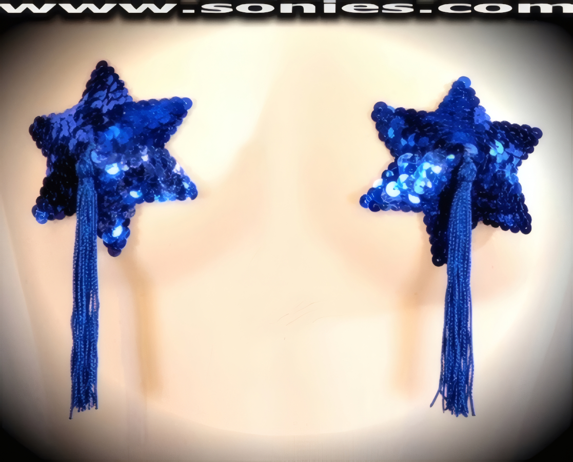 Hold on, we are in for a ride when you step-out on the stage wearing these exquisite hand crafted burlesque Traviata glimmer star shaped sequined pasties that are adorned with attached tassels finally for added twirling and whirling effect. Designed using the finest sequins for utmost radiance so that it is perfect under any lighting (One pair per package with Glue included). These Pasties are meant to surprise, seduce, and unleash desires beyond your wildest dreams. No detail was spared and no wish was denied. For stage or bedroom performance. Can be worn by Professionals or Semi Pro Burlesque Dancers, Pin-up Girls, Strip Tease, Exotic Dancers, Adult Entertainers, Transgenders, Transsexuals, Cross-Dressers, Cabaret Dancers, Pole Dancers and for Photography Models.   Style: 7010AH