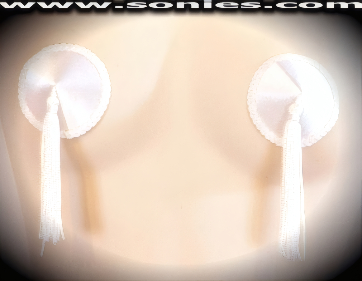 Provoke instant arousal wearing these extraordinarily hand crafted Camelias satin fabric pasties with fine glimmer sequin edging accent for utmost radiance so that it is perfect under any lighting and attached tassels finally for added twirling and whirling effect (One pair per package with Glue included). For stage or bedroom performance and can be worn by Professionals or Semi Pro Burlesque Dancers.   Style: 7038AH13