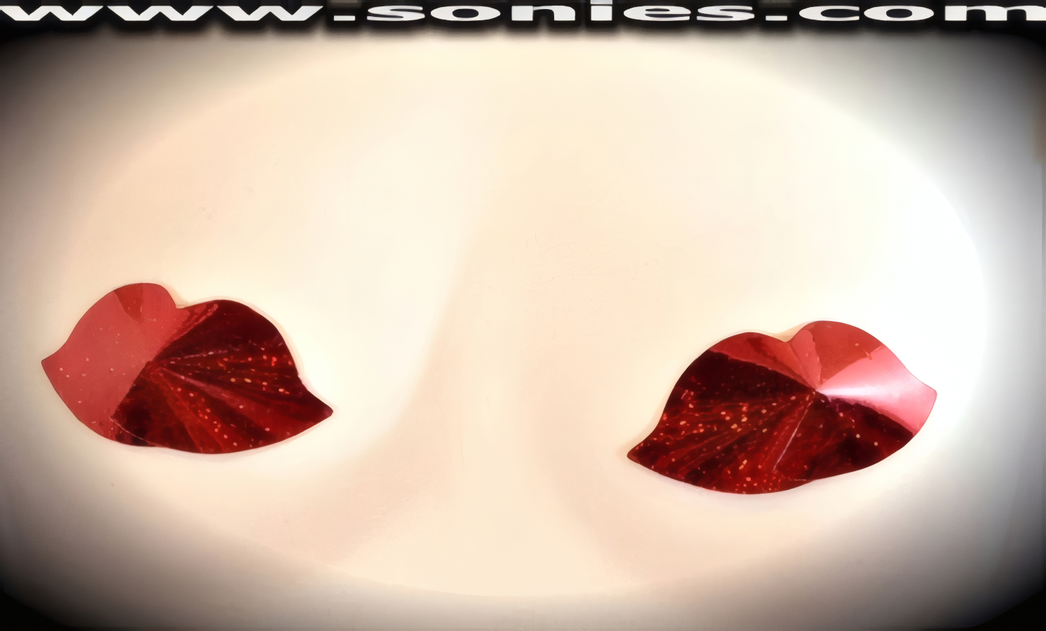 Every move you make is sure to thrill when you step-out on the stage wearing these hand crafted hazardously sexy Glitter Hologram Lips Shape Pasties (One pair per package with Glue included). For stage or bedroom performance and can be worn by Professionals or Semi Pro Burlesque Dancers.   Style: 7070AH