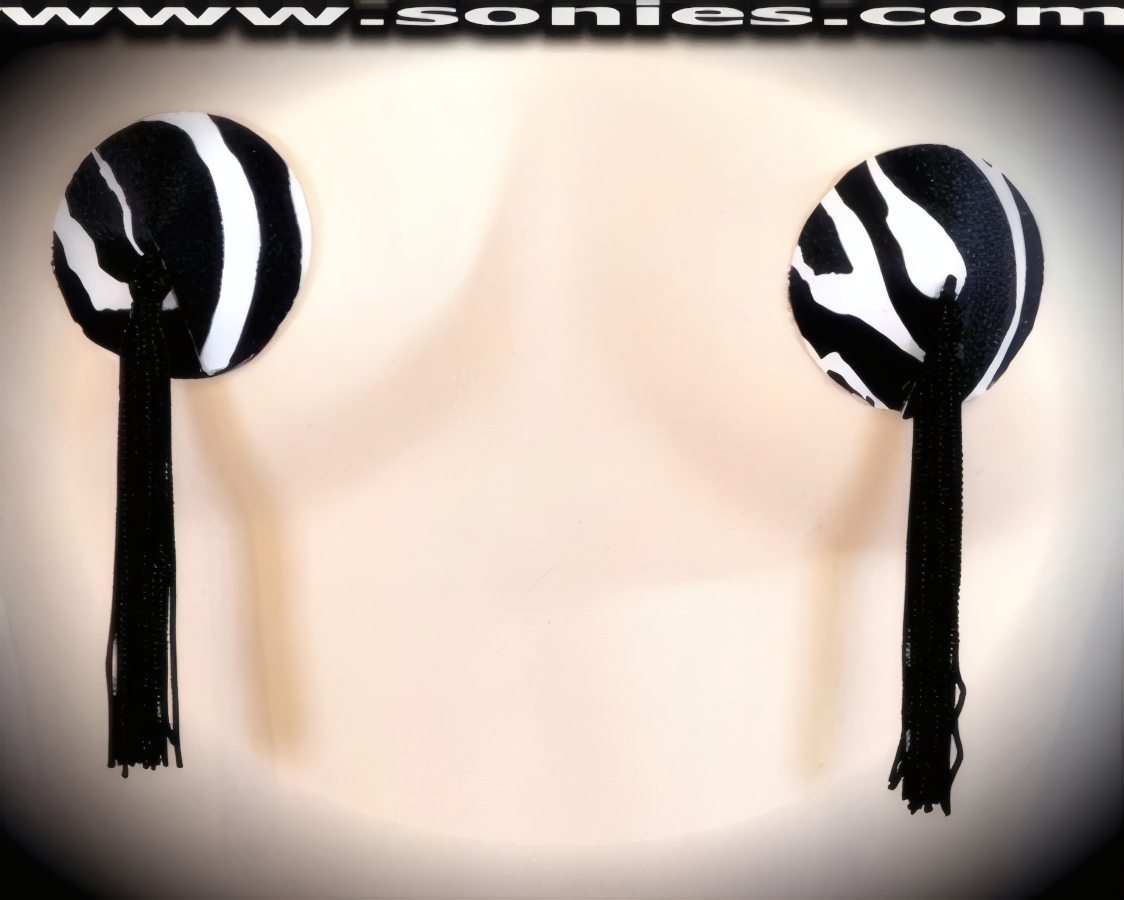 Hazardously Sexy in this Vividly Contrasting Black and White striped Botswana Zebra Print Fabric Pasties with attached Tassels Finally for added Twirling and Whirling effect (Glue Included).   Style: P149F