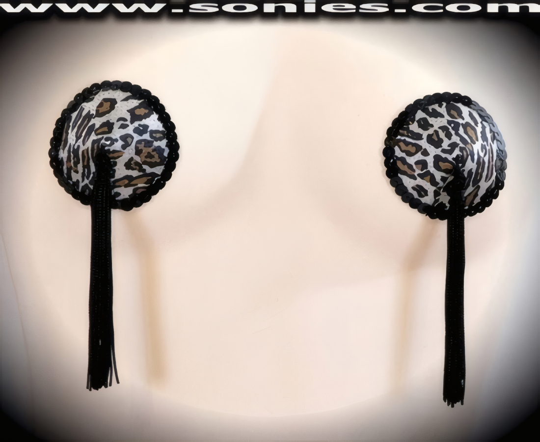 Be the star of the show with these sinfully alluring yet extraordinarily wonderful-to-wear hand crafted Panthera Jaguar print Lycra fabric Pasties with fine glimmer sequin edging accent for utmost radiance so that it is perfect under any lighting and attached tassels finally for added twirling and whirling effect (One pair per package with Glue included). These Pasties are meant to surprise, seduce, and unleash desires beyond your wildest dreams. No detail was spared and no wish was denied. For stage or bedroom performance. Can be worn by Professionals or Semi Pro Burlesque Dancers, Pin-up Girls, Strip Tease, Exotic Dancers, Adult Entertainers, Transgenders, Transsexuals, Cross-Dressers, Cabaret Dancers, Pole Dancers and for Photography Models.   Style: P149J