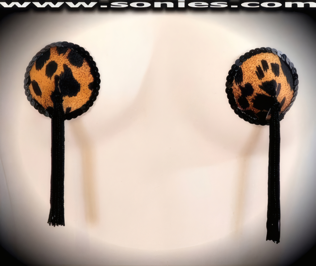 Be the star of the show with these sinfully alluring yet extraordinarily wonderful-to-wear hand crafted Carnivora Leopard print Lycra fabric Pasties with fine glimmer sequin edging accent for utmost radiance so that it is perfect under any lighting and attached tassels finally for added twirling and whirling effect (One pair per package with Glue included). These Pasties are meant to surprise, seduce, and unleash desires beyond your wildest dreams. No detail was spared and no wish was denied. For stage or bedroom performance. Can be worn by Professionals or Semi Pro Burlesque Dancers, Pin-up Girls, Strip Tease, Exotic Dancers, Adult Entertainers, Transgenders, Transsexuals, Cross-Dressers, Cabaret Dancers, Pole Dancers and for Photography Models.   Style: P149K