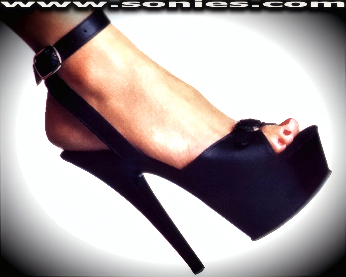 Be the center of attention when you step-out wearing these sleek Justine leather open-toe platform shoes. Crafted with adjustable buckle instep leather ankle strap which accommodates a wider variety of ankle sizes and adjustable front buckle leather vamp to suit wide feet, plus to ensure a comfortable fit. Has a soft cushioned suede leather insole, plus 6-inch spike heel and 1�-inch platform finally. These shoes have quality genuine professional-grade suede footbeds with a slight arch for the best comfort, feel and fit your feet will experience. Pure color plastics in the platform (bottom) units and the softest genuine leather in the uppers, plus are proudly Made in the United States of America. Compare the same shoe sizes� weight of these against our competitors and you will feel that weight difference. If you compare the same shoe sizes� outer sole with these against our competitors� imports then you will clearly see how sexy and dainty our shoes truly are. Every one of these shoes is individually inspected prior to leaving our factories. We maintain an extremely critical eye on quality. Every pair of these shoes we sell represents our commitment to our reputation. This style is perfect for stage, Exotic Dancers, life style events, monthly play parties, fetish events, adult alternative lifestyle gatherings, gentleman's clubs and formal atmosphere.     Style: JUSTINE