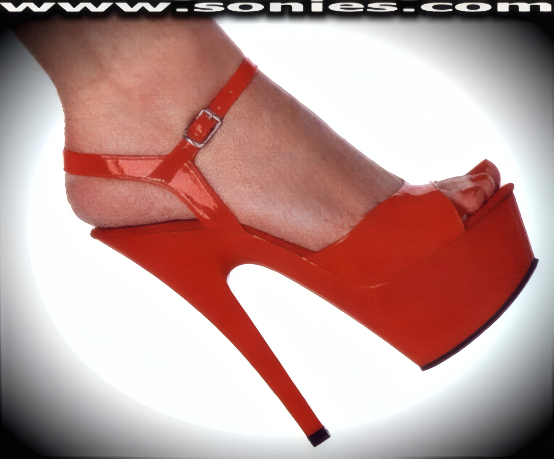 Be screen siren sexy wearing these Sassy patent leather (PVC) open-toe platform shoes. Crafted with adjustable buckle instep ankle strap which accommodates a wider variety of ankle sizes and soft vamps to ensure a comfortable fit. Has a soft cushioned suede leather insole, plus 6-inch spike heel and 1�-inch platform finally. These shoes have quality genuine professional-grade suede footbeds with a slight arch for the best comfort, feel and fit your feet will experience. Pure color plastics in the platform (bottom) units and the softest patent leather (PVC) in the uppers, plus are proudly Made in the United States of America. Compare the same shoe sizes� weight of these against our competitors and you will feel that weight difference. If you compare the same shoe sizes� outer sole with these against our competitors� imports then you will clearly see how sexy and dainty our shoes truly are. Every one of these shoes is individually inspected prior to leaving our factories. We maintain an extremely critical eye on quality. Every pair of these shoes we sell represents our commitment to our reputation. This style is perfect for stage, Exotic Dancers, life style events, monthly play parties, fetish events, adult alternative lifestyle gatherings, gentleman's clubs and formal atmosphere.     Style: SASSY