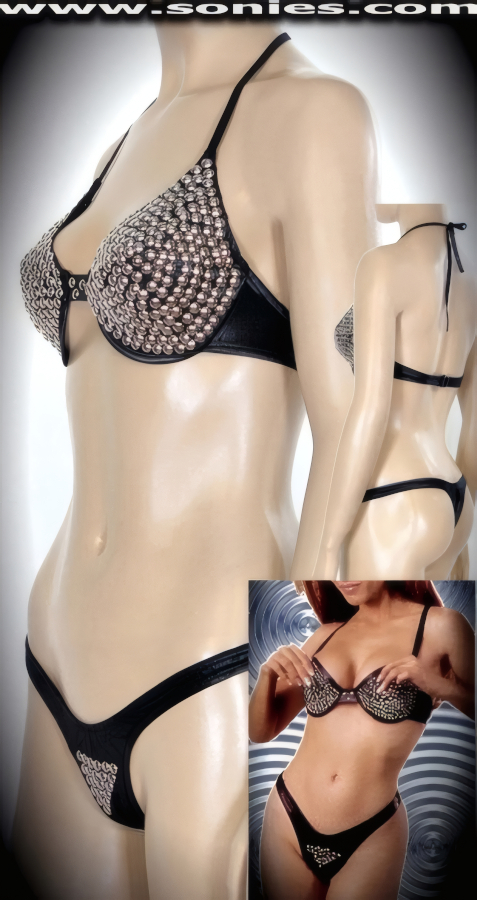 Demand some Attention in Our Ladies Cybele Two Piece Wet Look Stretch Lycra Playsuit Set. Uplift Projection Underwire Halter Style Bra Top with Tie Neck Straps and Deep Plunge D�collet�. Adorned with Multiple Chrome Metal Domes. Complementing Accented Metal Domes on Front Panty with Lined Crotch and Thong Back Detail Finish (15% Spandex, 85% Nylon).   Style: 083DW