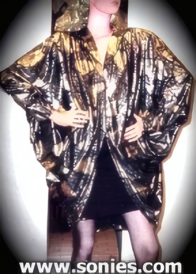 Magnificent Open Swing Evening Jacket with Pleaded Front Detail and Padded Shoulder Shaping.   Style: 2009SC