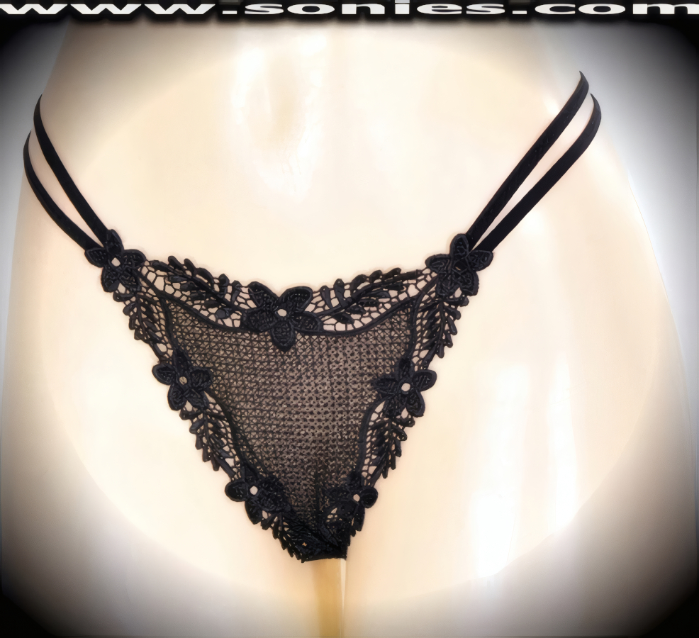 Banish your boring panties to the back of the drawer and dare to bare in this revealing adult entertainer's low-rise Scarlett brilliantly embroidered floral border see-through front dance wear thong bottom. Irresistibly enticing panty features double elasticized strappy sides to insure a great fit, lined crotch, and opaque thong back detail finish (10% Lycra, 90% Nylon. Wash delicate and hang dry). It pairs beautifully with any number of risqu� tops. May be worn with stiletto heel shoes or boots to create a phenomenal look. This style is perfect for stage, bedroom performance, life style events, pride week, monthly play parties, fetish events, adult alternative lifestyle gatherings, bachelor parties and gentleman's clubs.   Style: 2159SKA