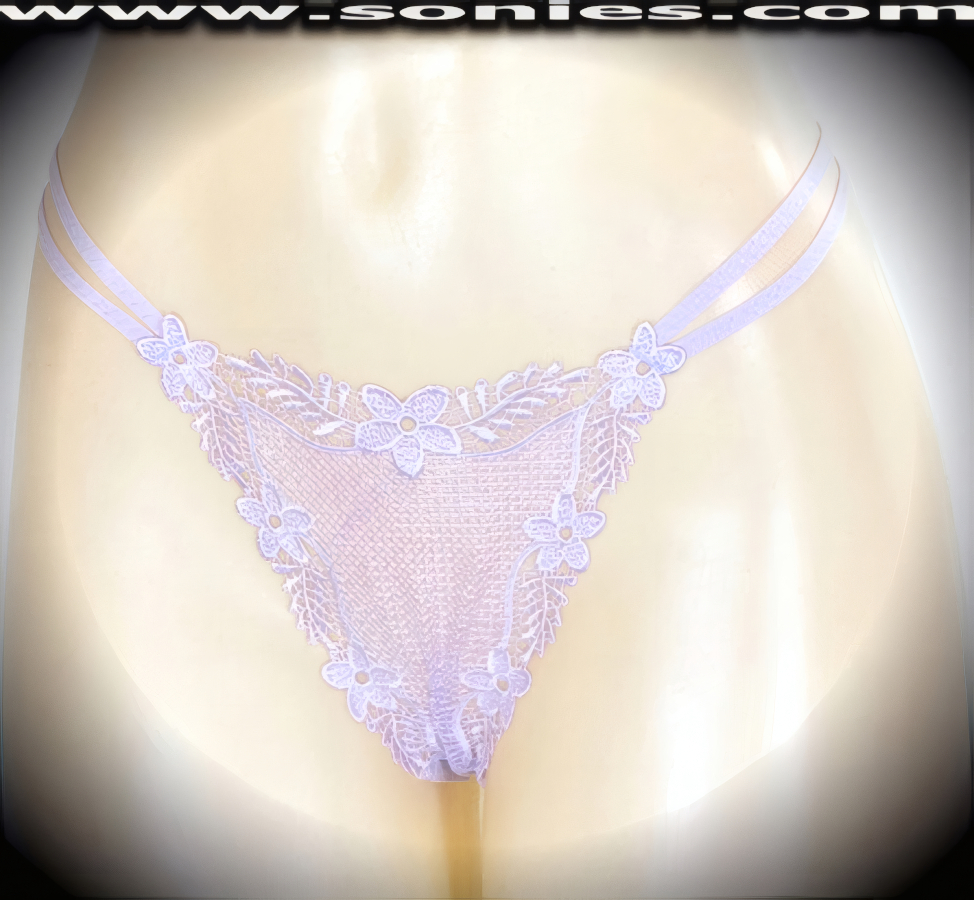 Banish your boring panties to the back of the drawer and dare to bare in this revealing adult entertainer's low-rise Scarlett brilliantly embroidered floral border see-through front dance wear thong bottom. Irresistibly enticing panty features double elasticized strappy sides to insure a great fit, lined crotch, and opaque thong back detail finish (10% Lycra, 90% Nylon. Wash delicate and hang dry). It pairs beautifully with any number of risqu� tops. May be worn with stiletto heel shoes or boots to create a phenomenal look. This style is perfect for stage, bedroom performance, life style events, pride week, monthly play parties, fetish events, adult alternative lifestyle gatherings, bachelor parties and gentleman's clubs.   Style: 2159SKF