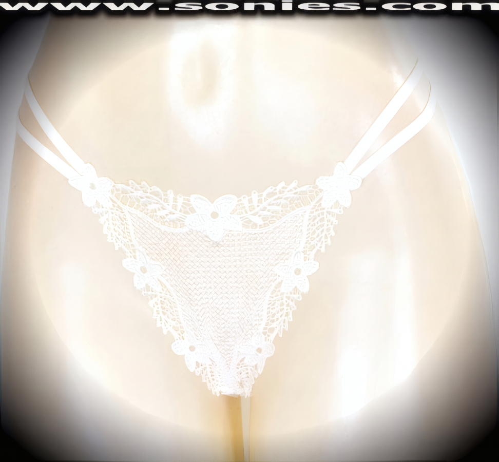 Banish your boring panties to the back of the drawer and dare to bare in this revealing adult entertainer's low-rise Scarlett brilliantly embroidered floral border see-through front dance wear thong bottom. Irresistibly enticing panty features double elasticized strappy sides to insure a great fit, lined crotch, and opaque thong back detail finish (10% Lycra, 90% Nylon. Wash delicate and hang dry). It pairs beautifully with any number of risqu� tops. May be worn with stiletto heel shoes or boots to create a phenomenal look. This style is perfect for stage, bedroom performance, life style events, pride week, monthly play parties, fetish events, adult alternative lifestyle gatherings, bachelor parties and gentleman's clubs.   Style: 2159SKH