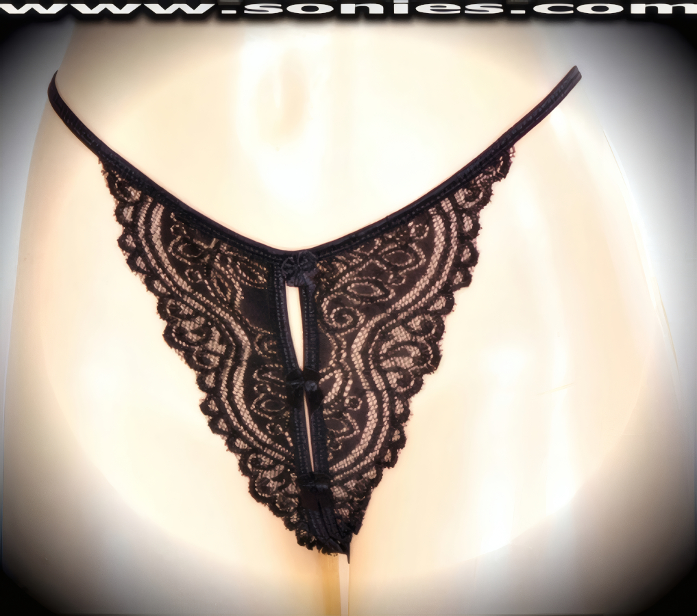 Go on a heart-racing frill ride in this ultra-sexy adult entertainer's low-rise Manaslu mischievously sheer scallop floral lace dance wear crotchless panty. This panty is made even more enticing by means of an eye-captivating slit front design, a convenience open crotch that leaves you uncovered and free, dual elasticized G-String back straps to insure a great fit, and prettied by means of satin bow appliqu� front detailing (10% Lycra, 90% Nylon. Wash delicate and hang dry). It pairs beautifully with any number of risqu� tops. May be worn with stiletto heel shoes or boots to create a phenomenal look. This style is perfect for stage, bedroom performance, life style events, pride week, monthly play parties, fetish events, adult alternative lifestyle gatherings, bachelor parties and gentleman's clubs.   Style: 2162SK