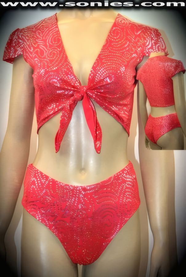 Get on with your Act in this Fabulous Two Piece Silver Aztec Swirl Stretch Foil Lycra Set. Seductive Short Sleeve Crop Top with Tie Front Closure for Off and On Ease Detail Finish. Complete with Matching Curve Hugging Cheeky Hot Pants and Lined Crotch Finally (15% Lycra, 85% Nylon).    Style: 4233SC