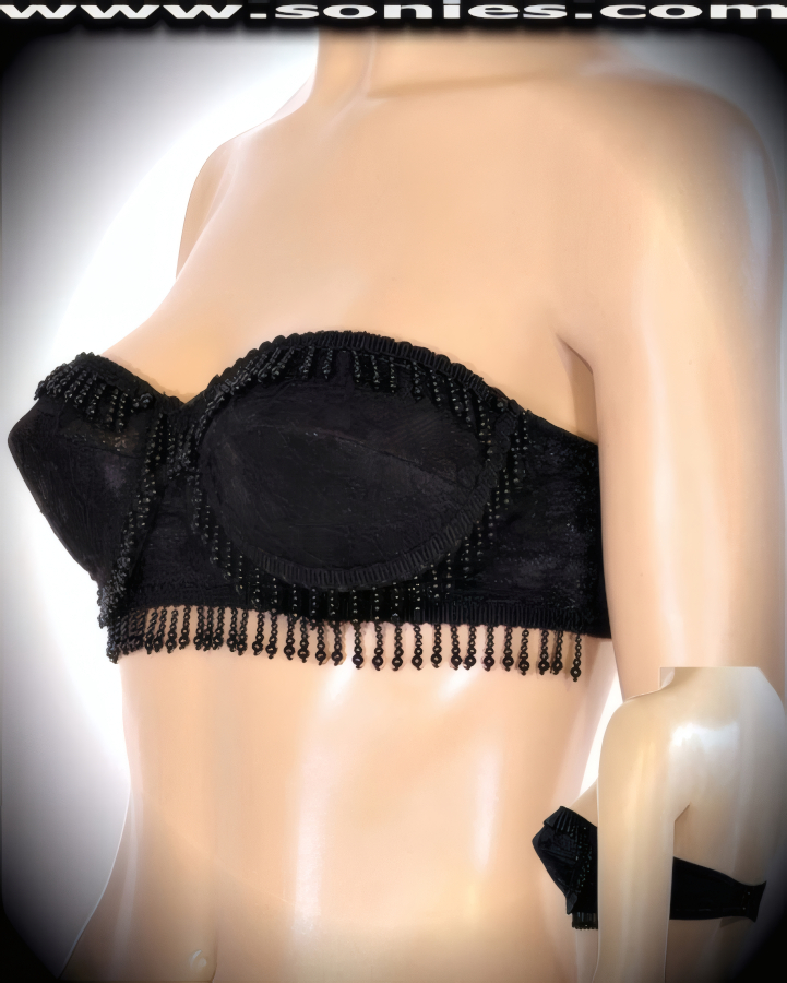 Pay homage to the era of excess in this over-the-top sexy Lucinda floral lace with hand beaded strapless bra style bustier. Cleavage enhancing design with molded underwired cups that takes a small bustline and pushes it up to create a magnificently deep cleavage. Crafted with black stonewashed piping detailing along the sides of the cups, plus has an adjustable hook and eye back closure to ensure a great fit (10% Lycra, 90% Nylon, exclusive of trim. Hand wash cold and line dry. Do not bleach). It pairs beautifully with any number of risqu� bottoms such as skirts, hot pants, thongs or G-Strings. May be worn with stiletto heel shoes or boots to create a phenomenal look. This style is perfect for stage, life style events, pride week, monthly play parties, fetish events, adult alternative lifestyle gatherings, bachelor parties, club wear, nightclubs, dance clubs and gentleman's clubs.  Style: 4992SC