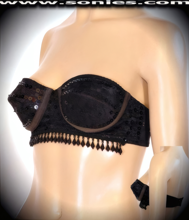 A striking design that perfectly accents your body is this flirtatious Luisa floral lace with sequin detailing, plus hand beaded strapless bra style bustier. Cleavage enhancing design with molded underwired cups that takes a small bustline and pushes it up to create a magnificently deep cleavage. Crafted with black stonewashed piping detailing along the sides of the cups, plus has an adjustable hook and eye back closure to ensure a great fit (10% Lycra, 90% Nylon, exclusive of trim. Hand wash cold and line dry. Do not bleach). It pairs beautifully with any number of risqu� bottoms such as skirts, hot pants, thongs or G-Strings. May be worn with stiletto heel shoes or boots to create a phenomenal look. This style is perfect for stage, life style events, pride week, monthly play parties, fetish events, adult alternative lifestyle gatherings, bachelor parties, club wear, nightclubs, dance clubs and gentleman's clubs.  Style: 4993SC