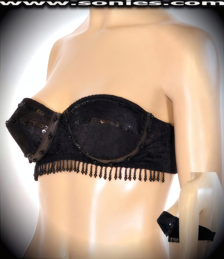 Knock out your competition wearing this breathtaking Rome lace and hand beaded strapless bra style bustier. Cleavage enhancing design with molded underwired cups that takes a small bustline and pushes it up to create a magnificently deep cleavage. Adjustable hook and eye back closure to ensure a great fit. It pairs beautifully with any number of risqu� bottoms such as skirts, hot pants, thongs or G-Strings. May be worn with stiletto heel shoes or boots to create a phenomenal look. This style is perfect for stage, life style events, pride week, monthly play parties, fetish events, adult alternative lifestyle gatherings, bachelor parties, club wear, nightclubs, dance clubs and gentleman's clubs.  Style: 4995SC