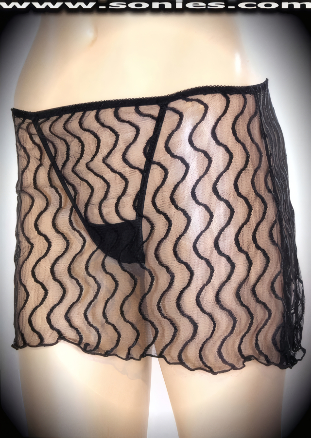 Keep it short and sexy in this flirty adult entertainer's Seriphus low-rise stretch wave lace pull-on mini-skirt that reveals a tempting attached lined center stage thong back panty. Features a silky soft sheer mesh fabric to trace your bodies contour and a comfort elasticized waistband to ensure a great fit. The low rise design makes the torso look longer for an incredibly seductive silhouette (10% Spandex, 90% Nylon. Wash delicate and hang dry). It pairs beautifully with any number of risqu� tops. May be worn with stiletto heel shoes or boots to create a phenomenal look. This style is perfect for stage, life style events, pride week, monthly play parties, fetish events, adult alternative lifestyle gatherings, bachelor parties, club wear, nightclubs, dance clubs, and gentleman's clubs.   STYLE: 915ASK