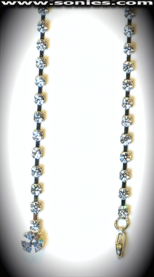 Things Will Definitely Heat Up in this Glorious Adjustable Intricate Anodized Silver Metal Belly Chain with Single Row Rhinestones that wraps around your luscious middle and ends gracefully with a Circular Large Rhinestone Tip Detail Finish. Secure and attractive Lobster Claw Clasp can be placed in any of the links to adjust the position of the chain. 36� -Inch Length.   STYLE: BC-002R