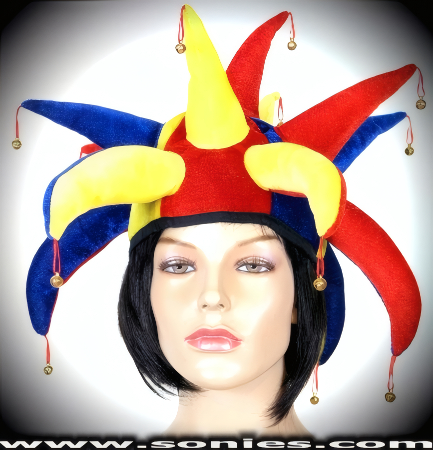 Sneaky and Conniving in this Unisex Court Jester's Hat with Dangling Bell Tip Detail Finish in Exquisite Multi Colored Velour. A must have costume accessory for any street carnival, stage performance costume or theatrical production.   Style: Cjester
