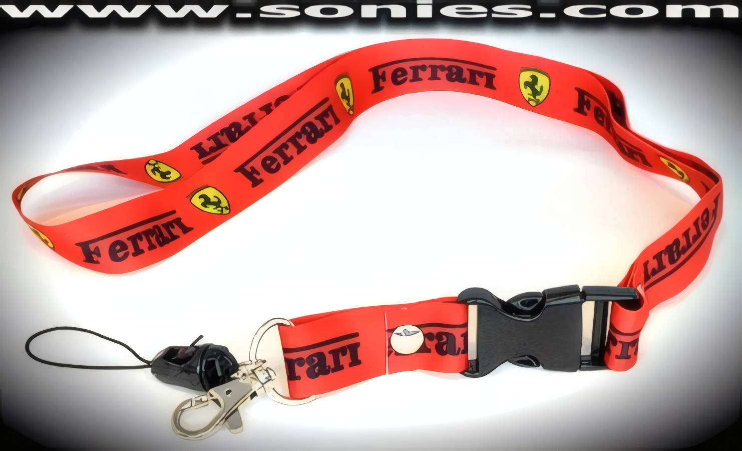 Stylish Ferrari Neck Strap with Dual Holder for both your Keys and Mobile Phone made of Durable Flat Woven Nylon. Now you can carry you mobile phone and keys at the same time as it has 2 attachments. Total Length of Strap 31-Inches (15�-Inches each side) and �-Inch Width. Steel Clip for Keys and Mobile Phone Attachment are Detachable from the Neck Strap. Mobile Attachment also unclips from the bottom for added Off and On Ease, so that when you're taking your important call you don't have to remove your Neck Strap.   STYLE: Ferr01