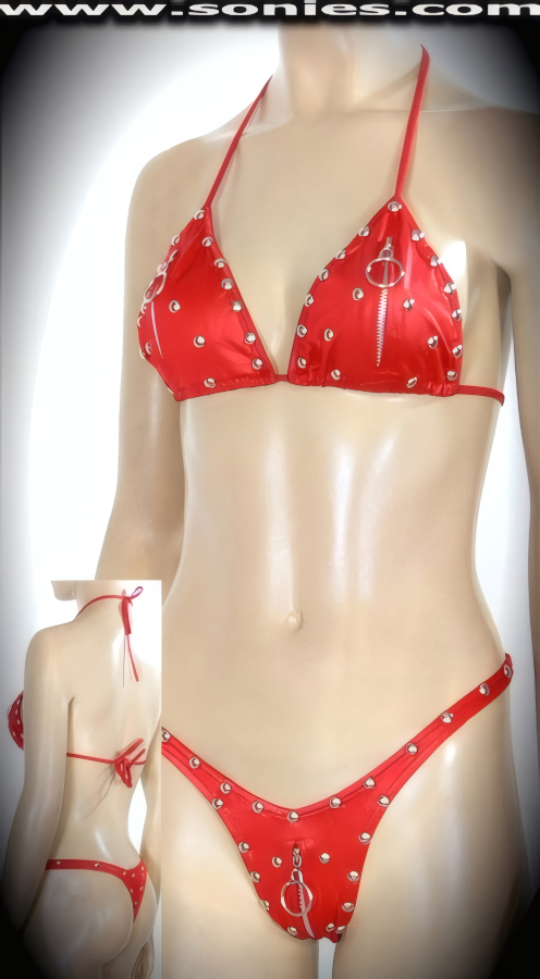 Brighten Up the Fun in Our Ladies Zanado Two Piece Wet Look Stretch Lycra Playsuit. Adjustable Triangle Tie Bra with Accented Metal Domes, Front Metal Zipper Detailing with Metal O-Ring Puller Finally for Added Peek-A-Boo Teasing Effect. Complementing Zip-Up Front Panty with Lined Crotch, Thong Back, Accented Metal Domes on Front and Back Finish (15% Spandex, 85% Nylon).   Style: HEW-51E