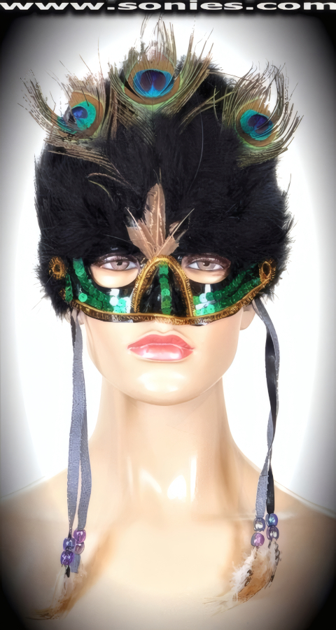 Make a Lasting Impression in Our Libitina Goddess Mask. Stunning array of lush natural feathers that frame the face in a rupture of Black, Green and Tan. Gold Trim Accent over the nose and under the Eyes with Green Sequin Detailing. Fringe on both sides with Beaded accent and Feather tip Finally. Attaches to the head with two elasticized straps around the back for a comfortable fit. A must have costume accessory for any street carnival, Vegas showgirl costume or theatrical production.   Style: MASK011