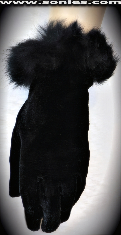 Simply refined in these Crist�bal wrist length stretch velvet gloves with fun fur trim cuff detail finish (Poly/Spandex). Dainty velvet gloves have a playful ambiance, much more so than formal opera length gloves.   Style: MFG-72801