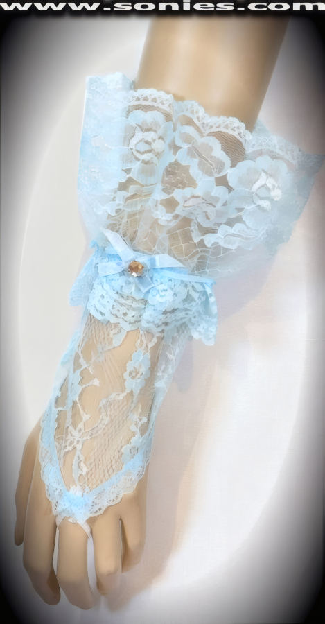 Glamorous Vesta European floral lace short fingerless gloves. Gorgeous floral lace pattern with middle finger loop, large ruffle lace wrist, satin bow plus rhinestone center detail finish. Adds an elegant touch to your attire. Dainty lace fingerless gloves have a playful ambiance, much more so than formal opera length gloves. This style is perfect for formal, bridal, prom, d�butante and Opera Ball.   Style: MFG-72803