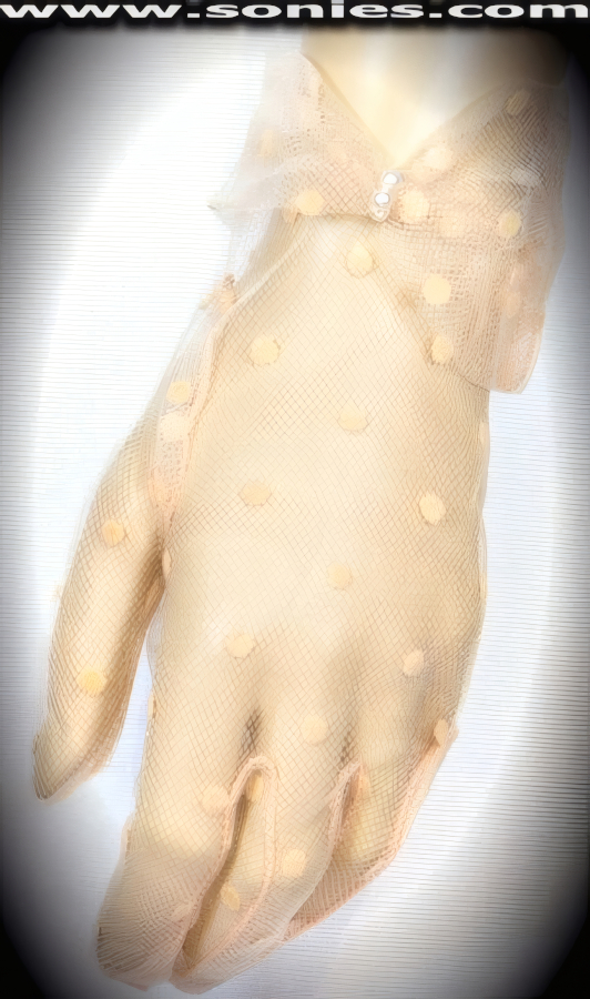 Serve him his fantasy in these Achaea sultry wrist length dotted stretch mesh gloves with pearl gathered cuff detail finish. Adds an elegant touch to your attire. Dainty mesh gloves have a playful ambiance, much more so than formal opera length gloves. This style is perfect for formal, bridal, prom, d�butante and Opera Ball.   Style: MFG-72807C