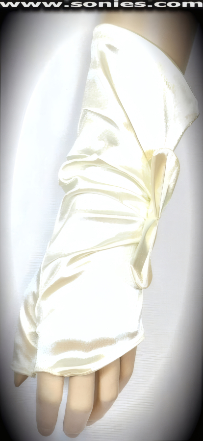 Glamorous above the wrist length Venus satin Lycra fingerless gloves with gather at cuff and large satin bow detail finish. Gorgeous satin gloves with no fingers and half thumb finally. It pairs beautifully with any number of vestures. This style is perfect for formal, bridal, prom, d�butante and Opera Ball.   Style: MFG-72817